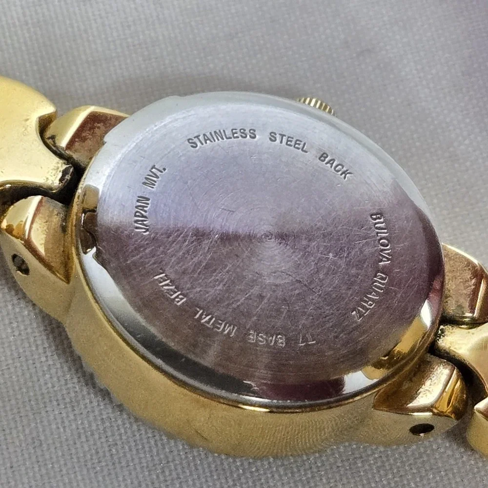 Bulova Women 98R18 Luxury Diamond Bezel Gold Tone Quartz Watch 5.5
